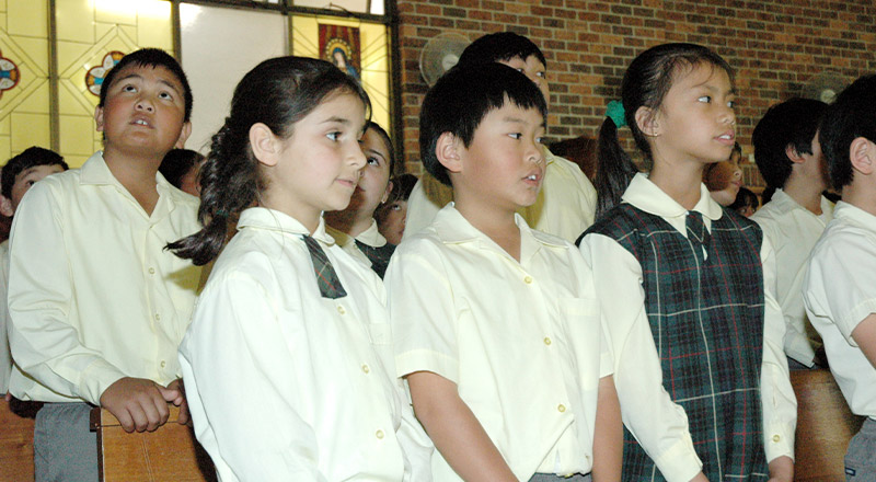 Students from St Aidan's Catholic Primary School Rooty Hill at local church