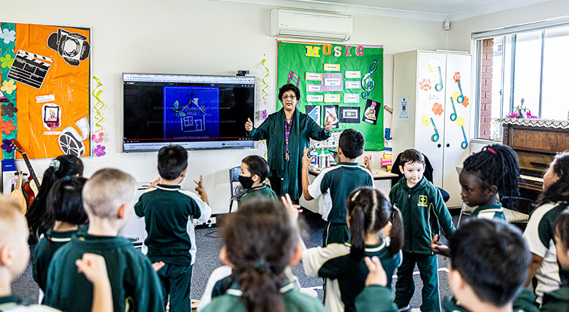 Teacher inspiring class at St Aidan's Catholic Primary Rooty Hill
